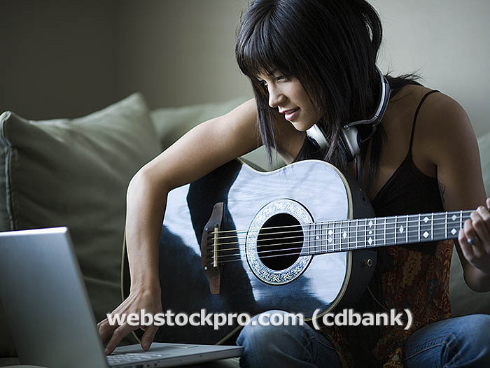 guitar computer and woman