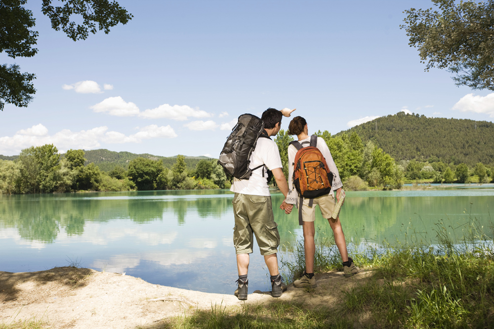 couple trekking outdoor Romantic tour Stock Photo