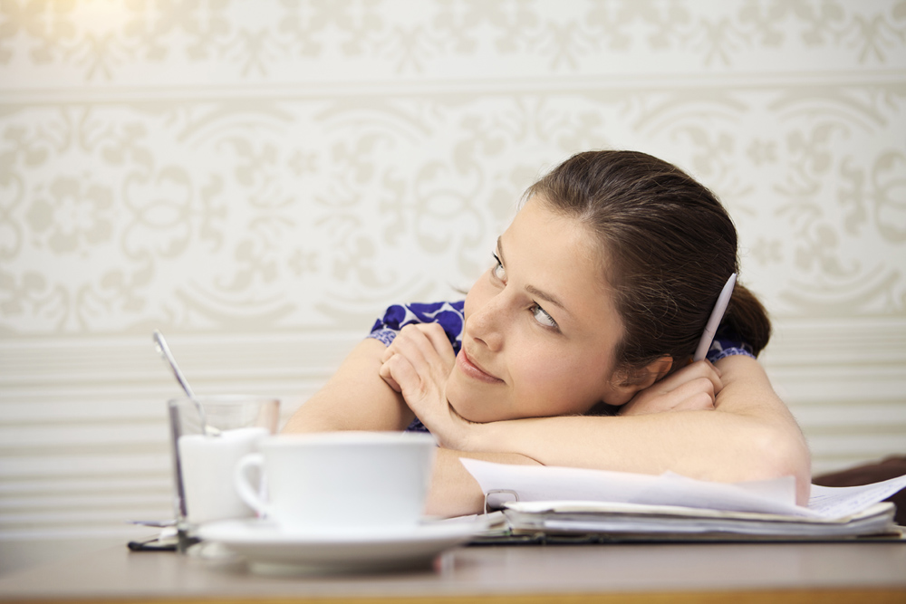 Student studying in a cafe Stock Photo