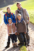 Young family posing in park Photo (mon223139)